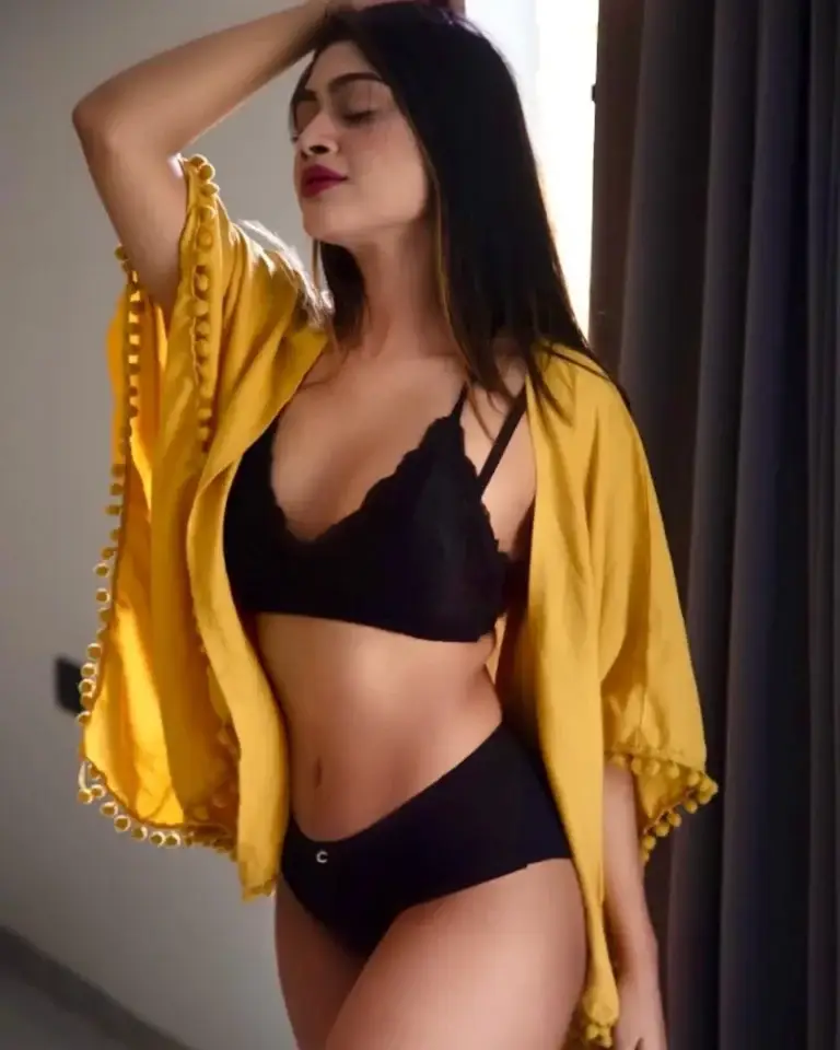 Beautiful Aarohi enjoying a quiet dinner date, offering the best escorts in Emirates Hill experience.